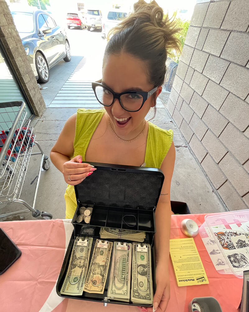 person holding a money box