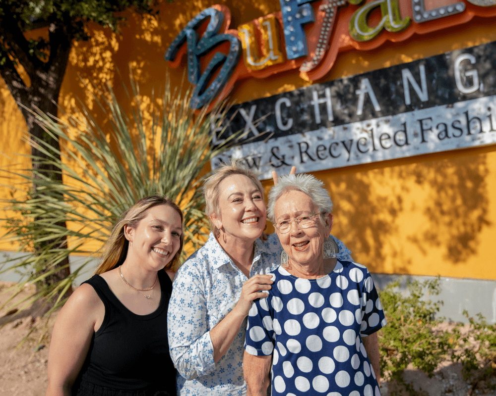 three Buffalo Exchange employees