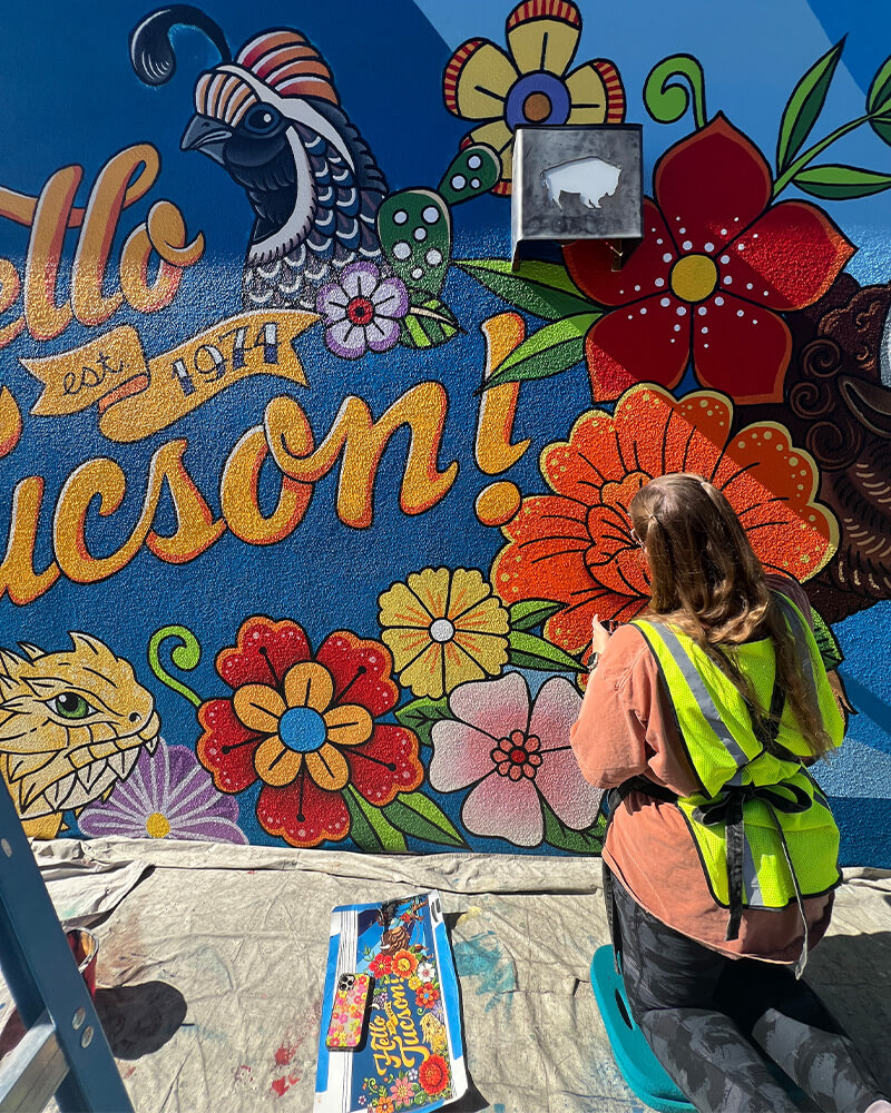 quinn painting the mural